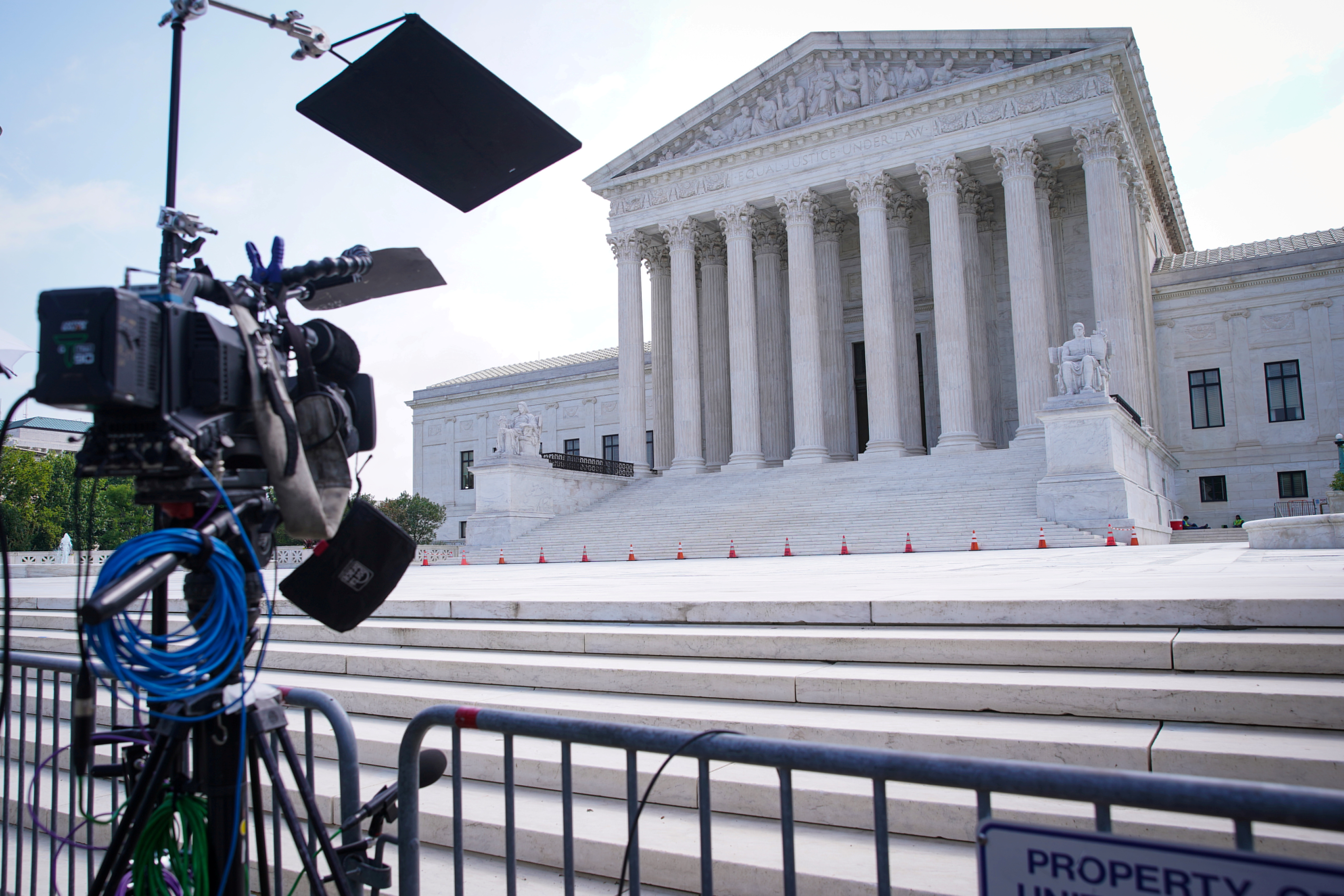The Supreme Court building is seen in Washington, June 21. U.S. Supreme Court justices on Tuesday signaled a willingness to let Kentucky's Republican attorney general defend his state's statute — struck down by lower courts — after its Democratic governor dropped the case.