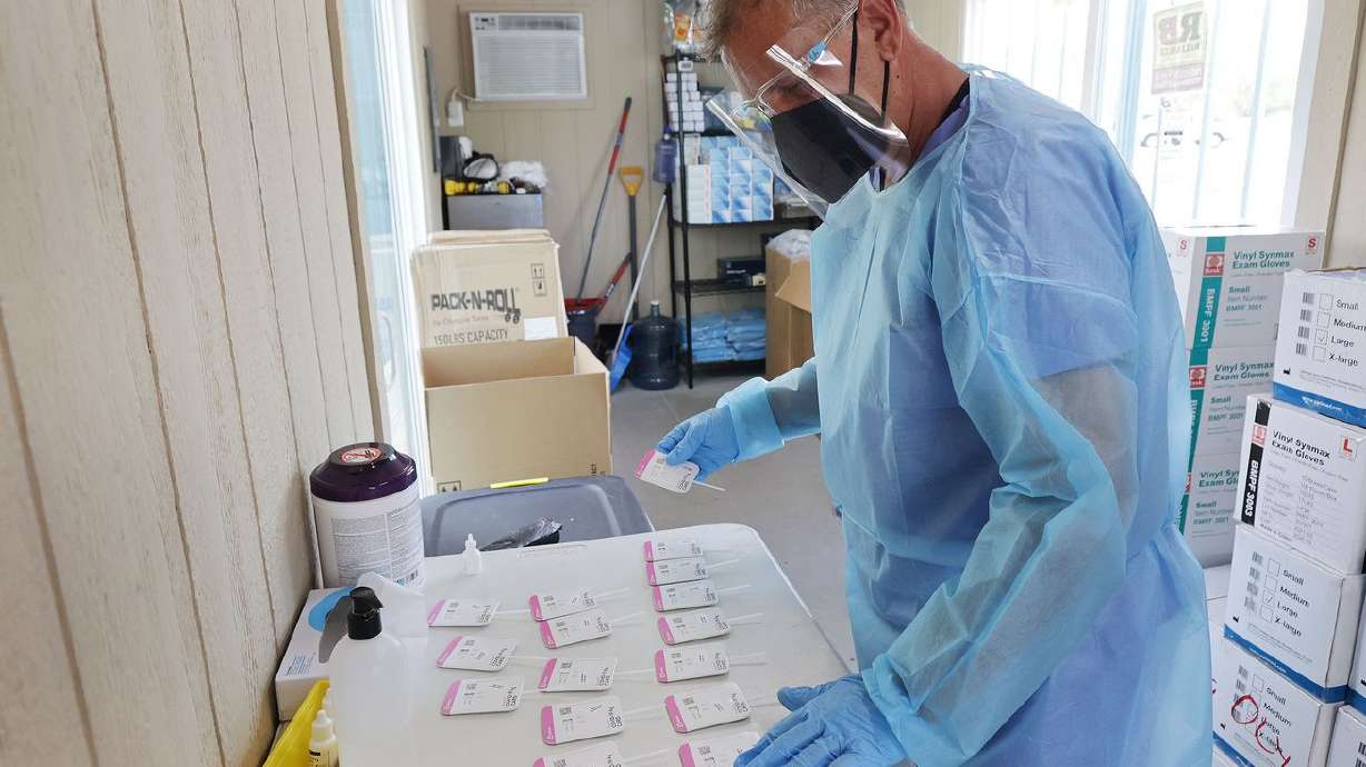 COVID-19 tests are processed at the Mount Olympus Senior Center parking lot in Millcreek on Tuesday, Oct. 5, 2021. There have now been more than 3,000 lives lost in Utah to COVID-19.