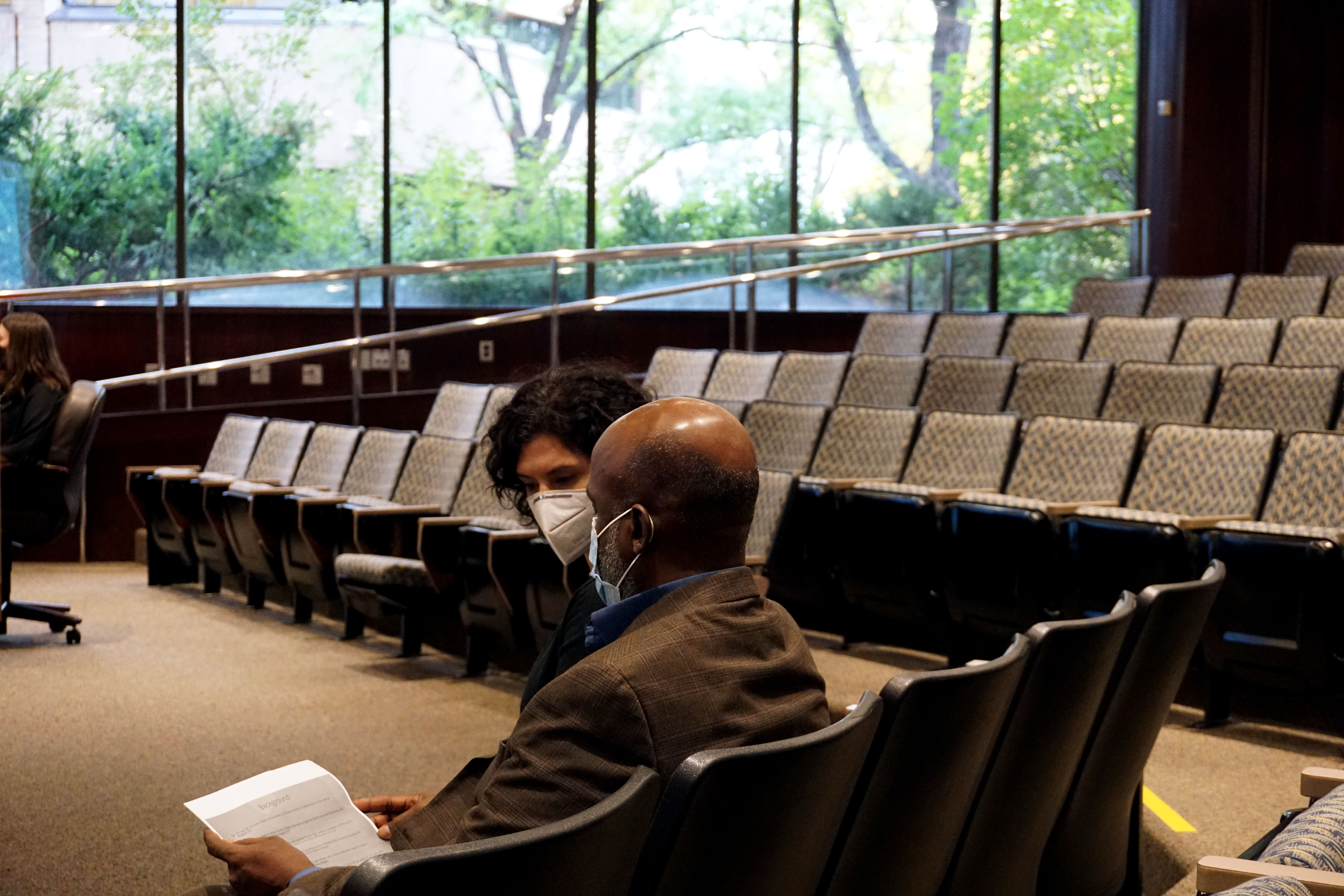 Natalie El-Deiry of International Rescue Committee and Aden Batar of Catholic
Community Services of Utah wait to speak before Salt Lake County Council on Tuesday.