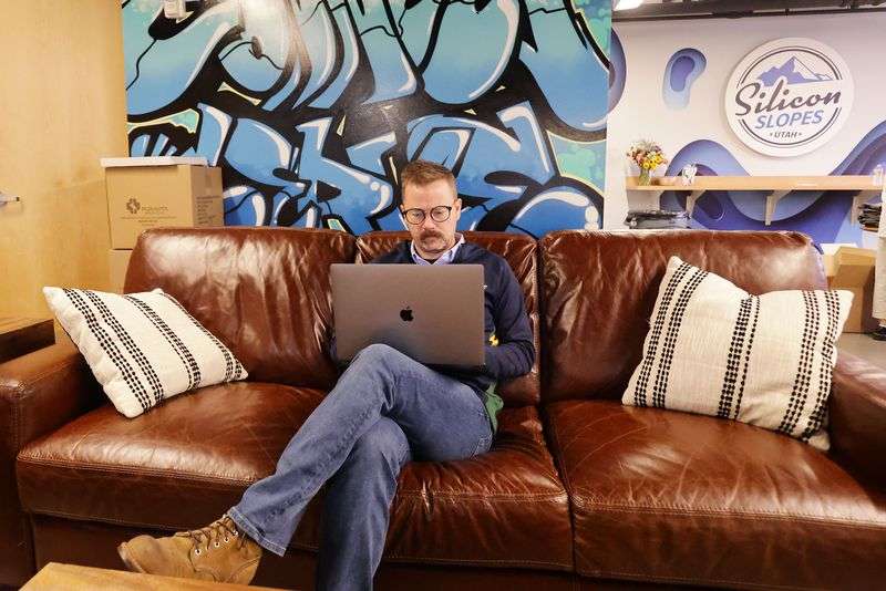Silicon Slopes Executive Director Clint Betts works at
the organization’s office in Lehi on Friday, Oct. 8,
2021.