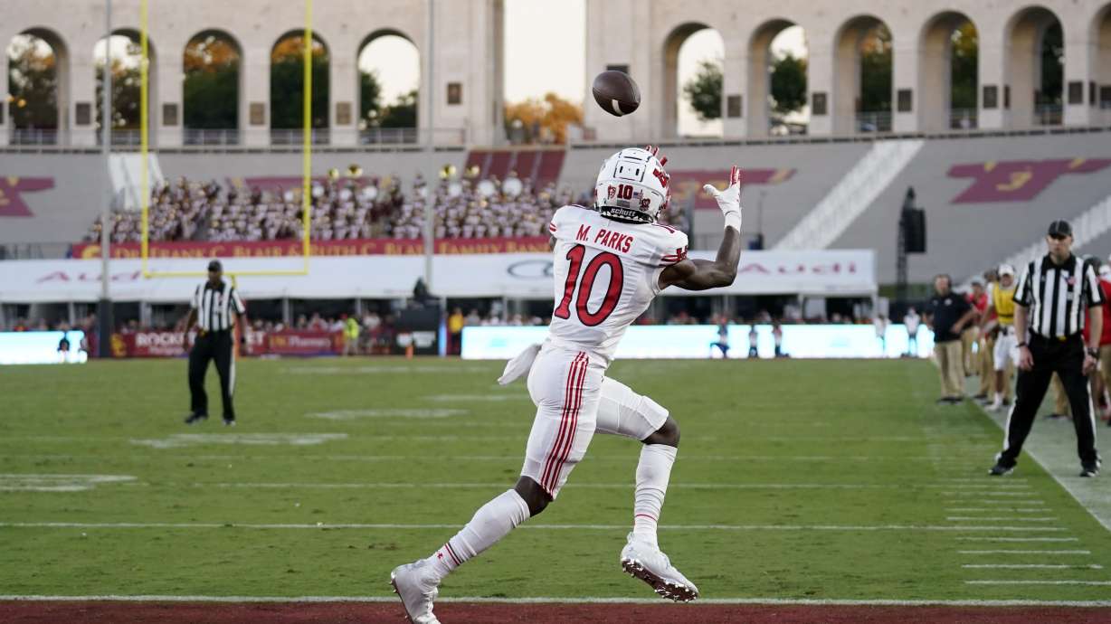Utah wide receiver Money Parks (10) makes a touchdown catch during the first half of the team's NCAA college football game against Southern California on Saturday, Oct. 9, 2021, in Los Angeles.