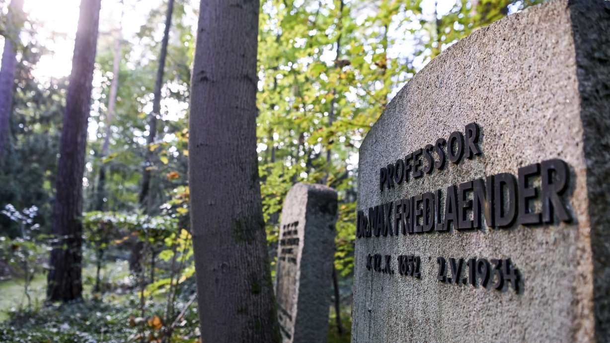 This Tuesday photo shows the grave of Max Friedlaender, a musicologist of Jewish faith at the Suedwestkirchhof Stahnsdorf, Germany. The German government's top official against antisemitism on Wednesday criticized the burial of a Holocaust denier on the former gravesite of a known Jewish musicologist.