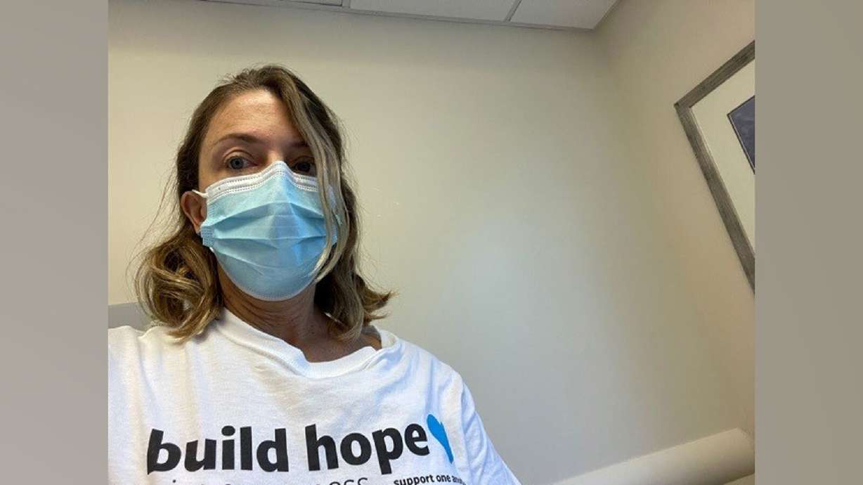 Anne LaPorte while receiving chemo treatment two weeks ago in her "build hope" shirt from Lung Cancer Resesarch Foundation's Free to Breathe walk.