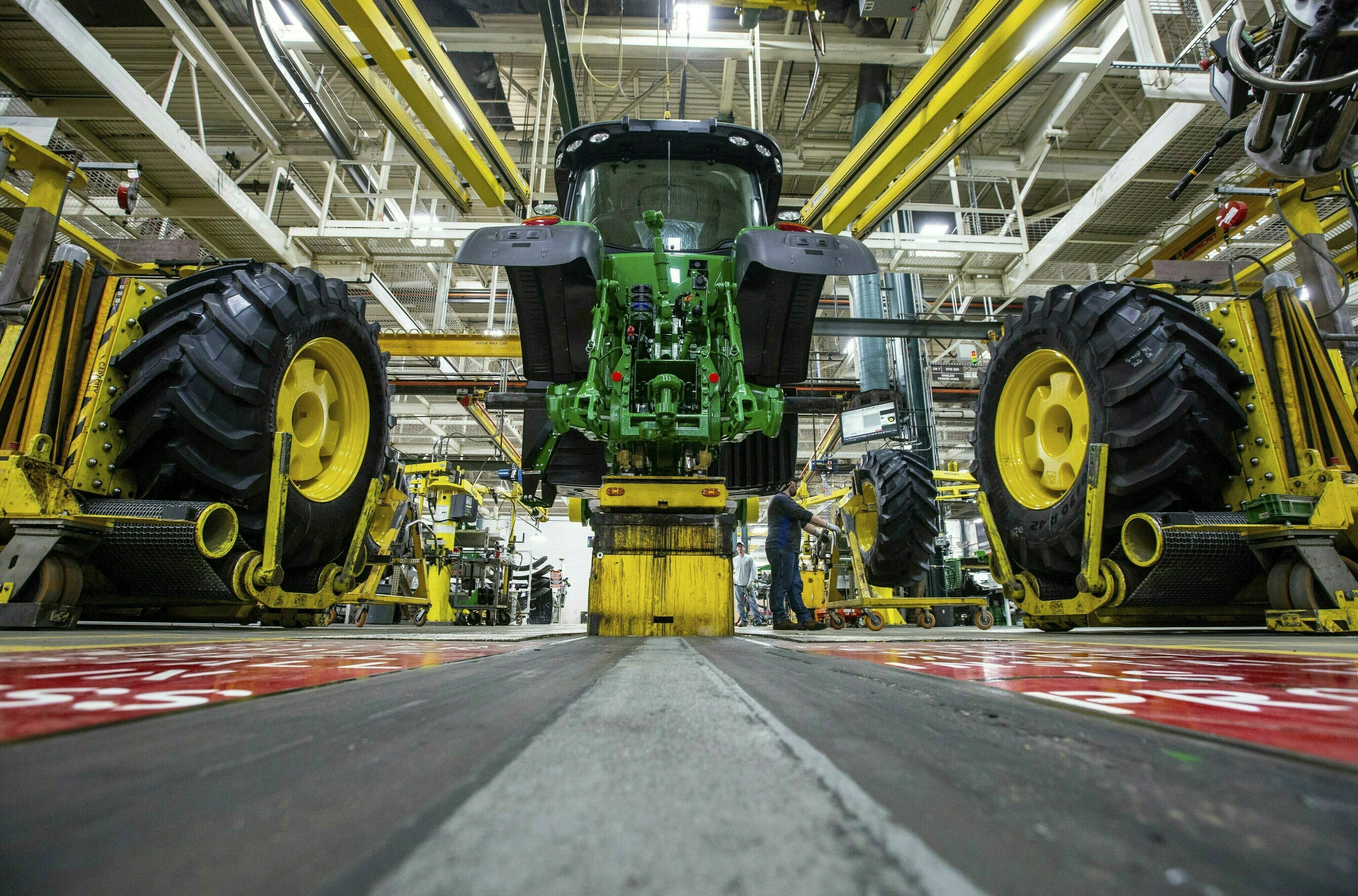 The vast majority of United Auto Workers union members rejected a contract offer from Deere & Co. Sunday that would have delivered at least 5% raises to the workers who make John Deere tractors and other equipment.
