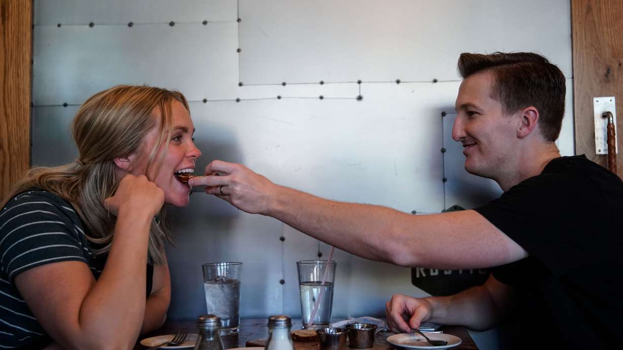 Brookston Jeppson and his wife, Haley, during a date night at a restaurant in Orem on Friday, Oct. 1.