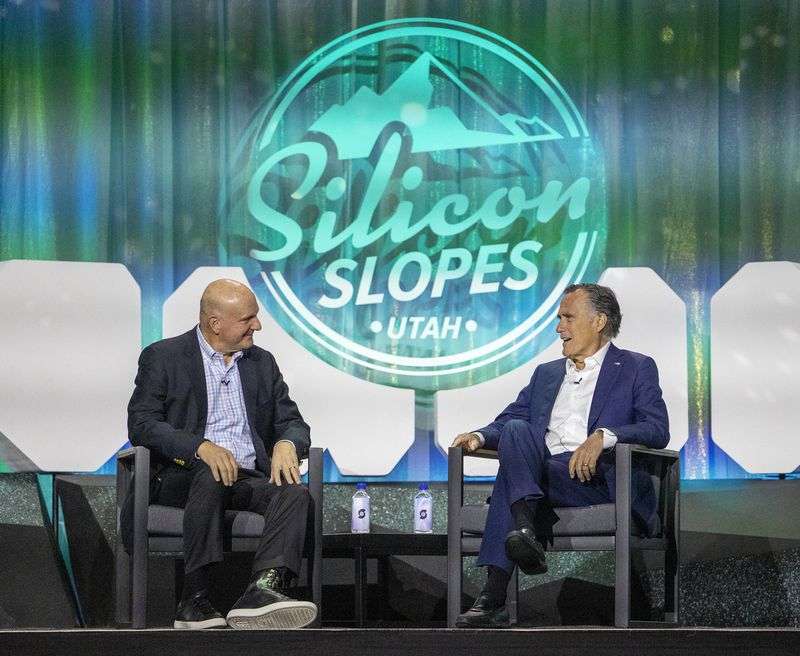 Steve Ballmer, owner of the LA Clippers and former
Microsoft CEO, talks with Sen. Mitt Romney, R-Utah, at the Silicon
Slopes Summit at the Salt Palace in Salt Lake City on Wednesday.