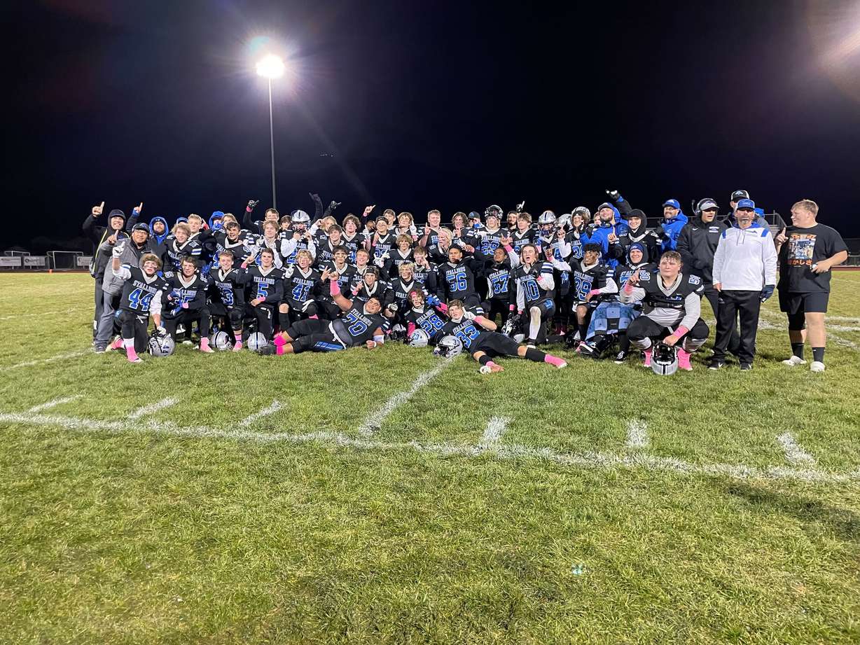 Stansbury poses for a team picture after winning the Region 7 title on Wednesday, Oct. 13, 2021.