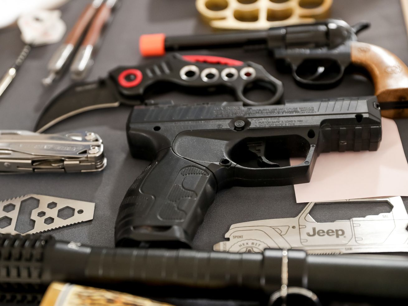 A collection of items confiscated at Transportation Security Administration checkpoints at the Salt Lake City
International Airport are displayed at the airport in Salt Lake City on Dec. 14, 2018. Apparently many Americans — a record
number, according to the TSA — were caught trying to take their firearms on airplanes this year, including at the Salt Lake City
International Airport.