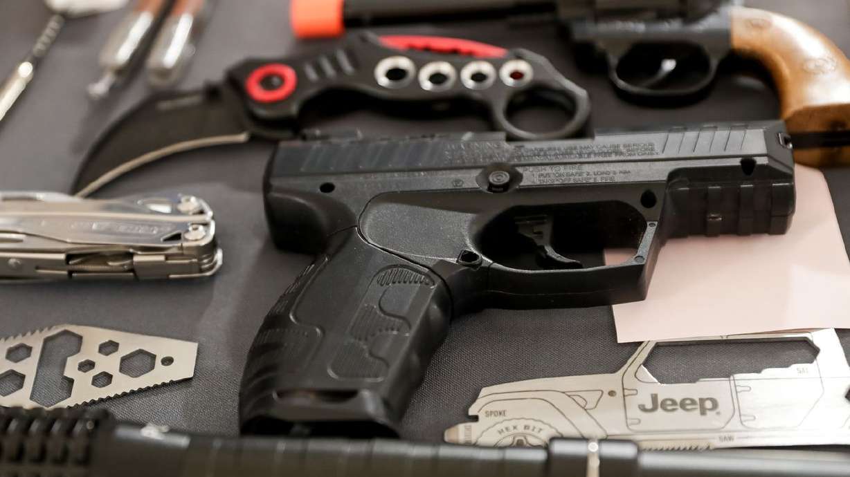 A collection of items confiscated at Transportation Security Administration checkpoints at the Salt Lake City
International Airport are displayed at the airport in Salt Lake City on Dec. 14, 2018. Apparently many Americans — a record
number, according to the TSA — were caught trying to take their firearms on airplanes this year, including at the Salt Lake City
International Airport.