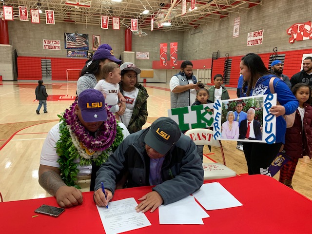 East High defensive tackle Siaki "Apu" Ika, shown here signing his National Letter of Intent to play football for LSU, once committed to BYU before a college career that took him to Baylor and former Tigers defensive coordinator Dave Aranda.