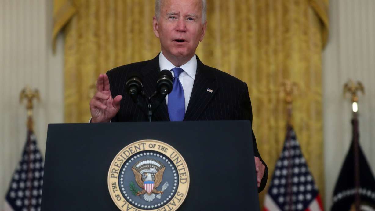 U.S. President Joe Biden delivers remarks from the East Room at the White House in Washington, D.C., Wednesday. White House officials are meeting with the U.S. Chamber of Commerce and others as the administration races to issue a rule to implement Biden's plan to require private-sector workers to be vaccinated against COVID-19.