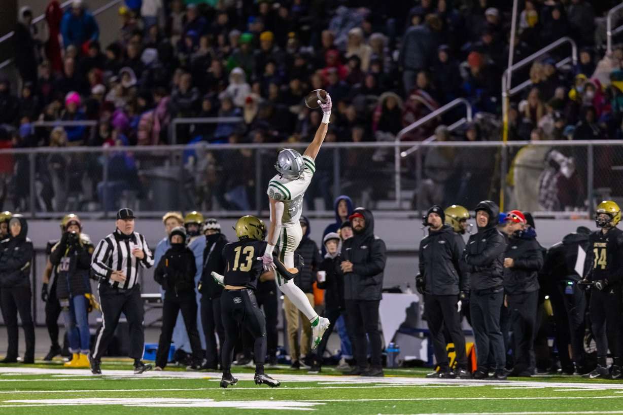 Olympus tight end Anthony Olsen makes a one-handed catch during its rivalry game against Skyline on Oct. 15, 2021. Olympus would win the game 27-7.