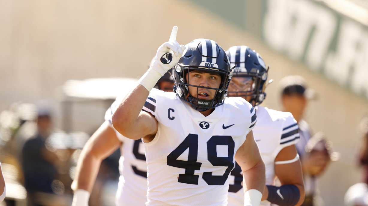 BYU linebacker Payton Wilgar runs onto the field during the Cougars' road game at Baylor, Saturday, Oct. 16, 2021 at McLane Stadium in Waco, Texas.