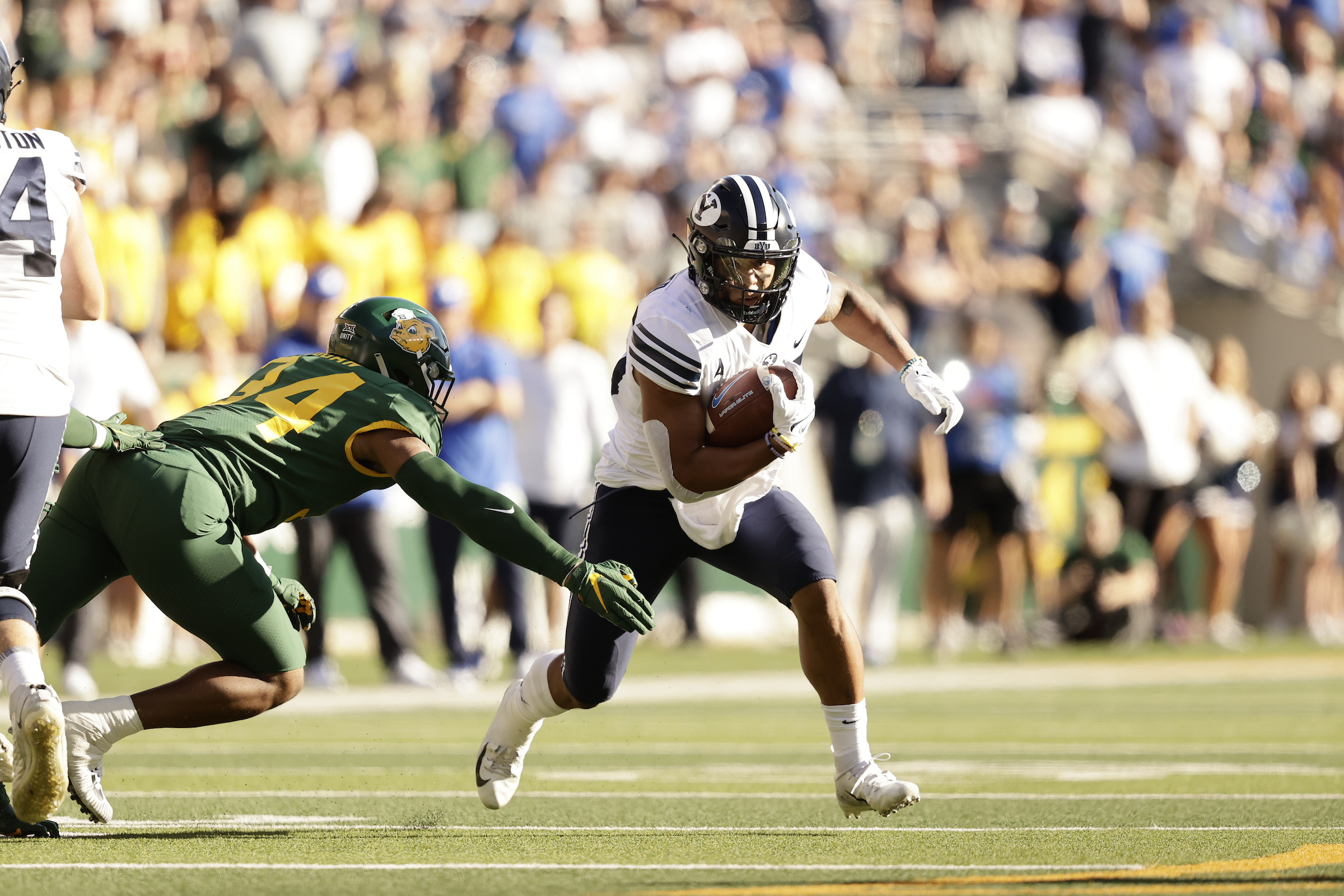 BYU running back Tyler Allgeier runs against Baylor during the Cougars' road game at Baylor, Saturday, Oct. 16, 2021 at McLane Stadium in Waco, Texas.