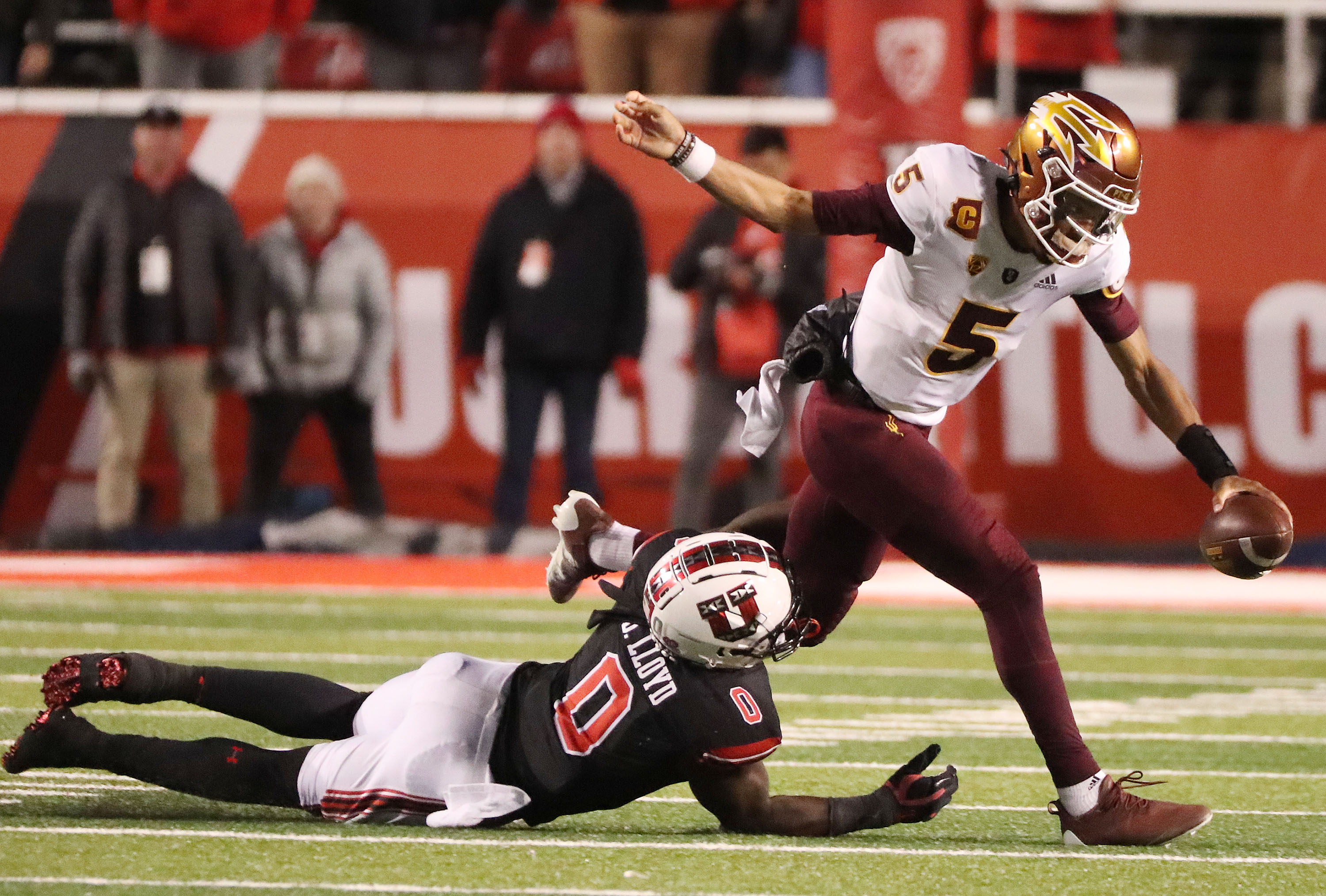 Utah Utes linebacker Devin Lloyd (0) sacks Arizona State Sun Devils quarterback Jayden Daniels (5) in Salt Lake City on Saturday, Oct. 16, 2021. Utah won 35-21.