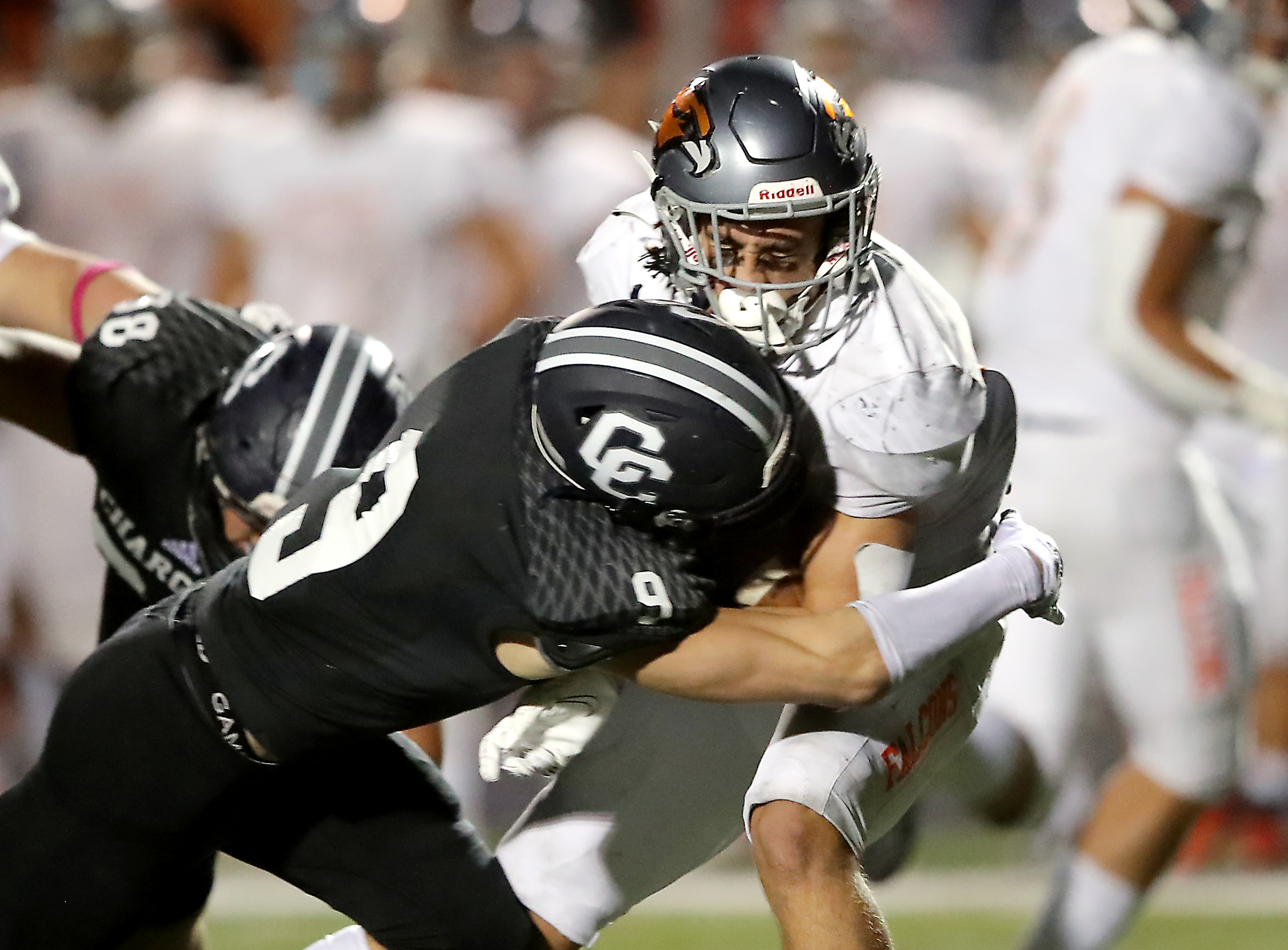 Corner Canyon’s Harrison Taggart brings down Skyridge’s Jeter Fenton during a high school football game at Corner Canyon in Draper on Friday, Sept. 24, 2021. Corner Canyon won 38-23.