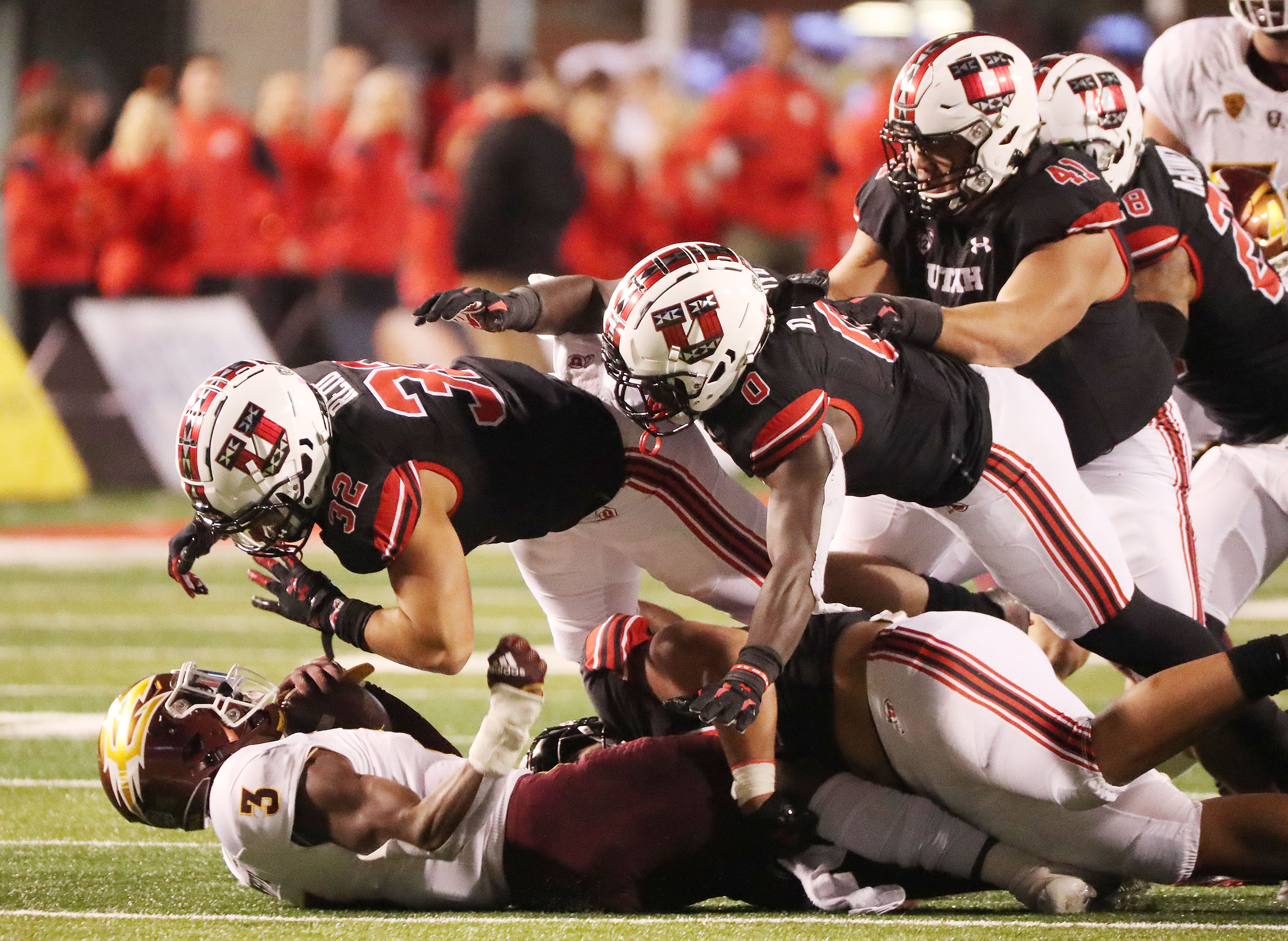 Arizona State Sun Devils running back Rachaad White (3) is gang tackled by the Utah Utes defense in Salt Lake City on Saturday, Oct. 16, 2021. Utah won 35-21.