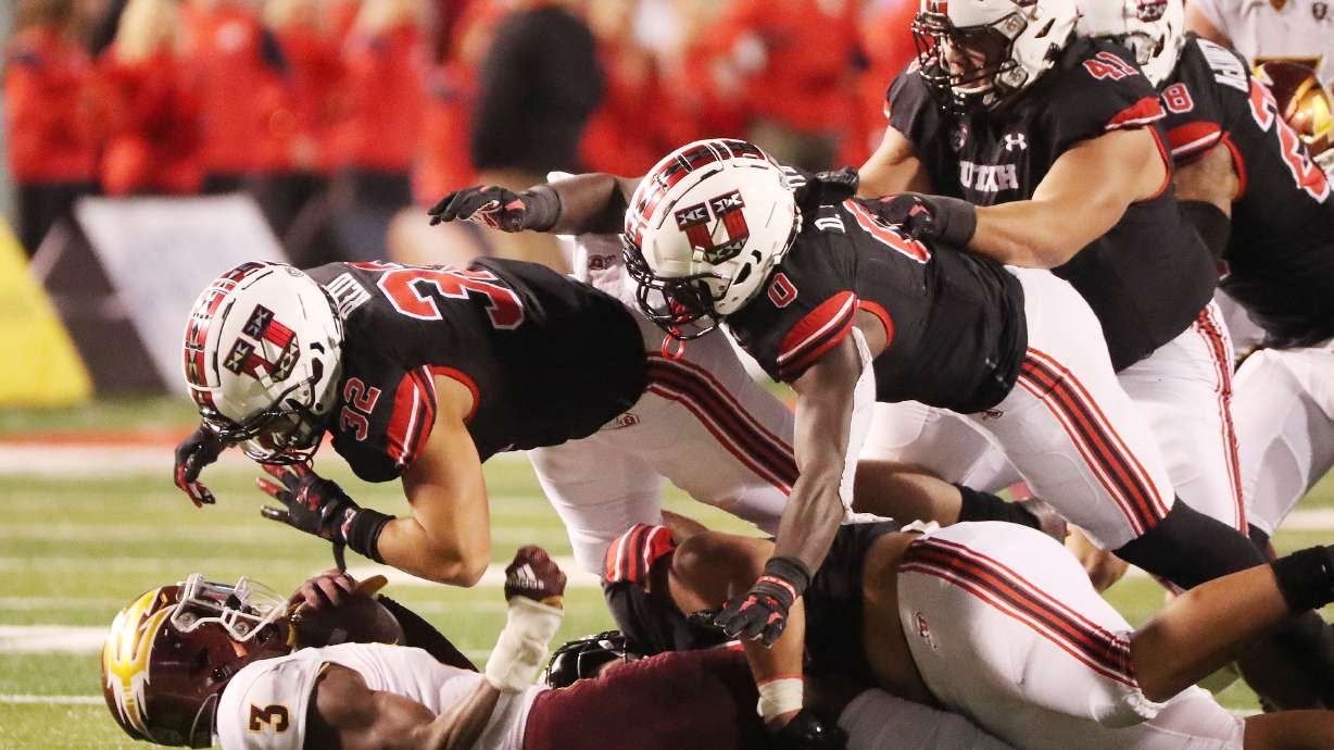 Arizona State Sun Devils running back Rachaad White (3) is gang tackled by the Utah Utes defense in Salt Lake City on Saturday, Oct. 16, 2021. Utah won 35-21.