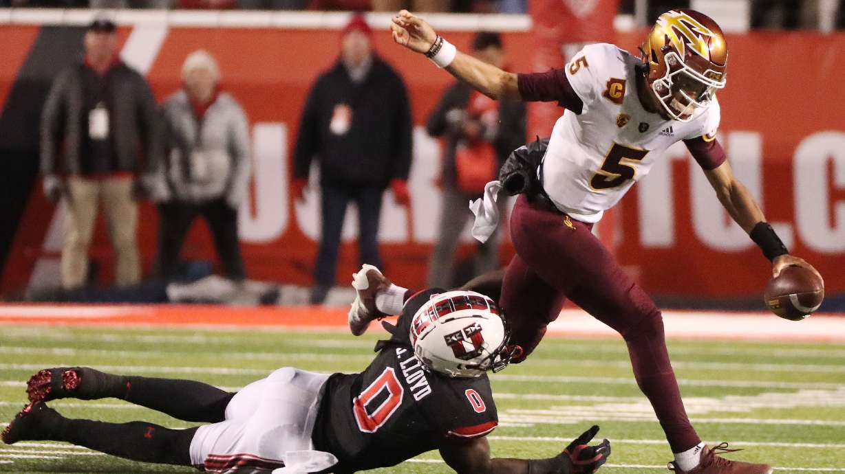 Utah Utes linebacker Devin Lloyd (0) sacks Arizona State Sun Devils quarterback Jayden Daniels (5) in Salt Lake City on Saturday, Oct. 16, 2021. Utah won 35-21.