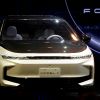 Carmakers shift up a gear in race to go electric