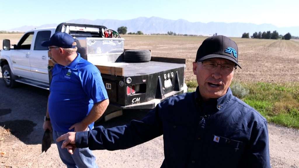 Farmer Clay Carter with Tony Richards, resource coordinator with the Utah Department of Agriculture and Food.
