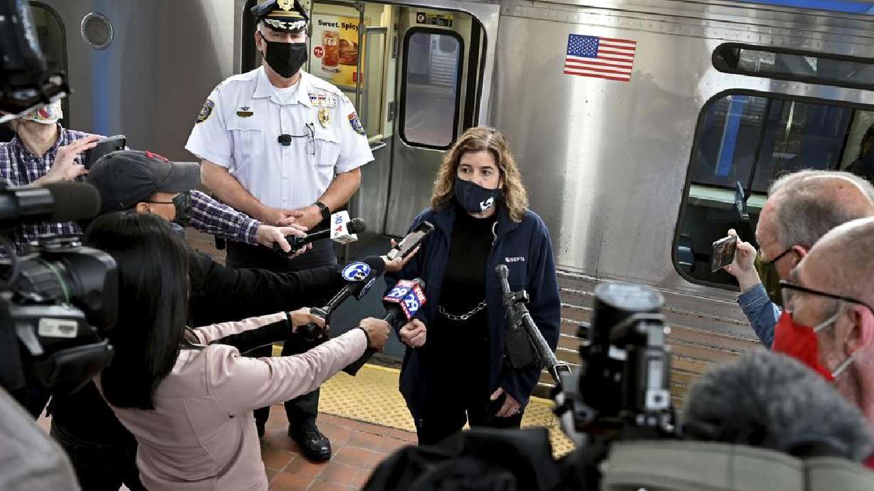 SEPTA General Manager Leslie Richards speaks during a news conference as SEPTA Transit Police Chief Thomas Nestel III stands behind her on an El platform at the 69th Street Transportation Center, Monday in Philadelphia, following a brutal rape on the El, as other riders watched, over the weekend. They discussed the emergency call boxes on SEPTA trains and how to properly contact police from the trains.
