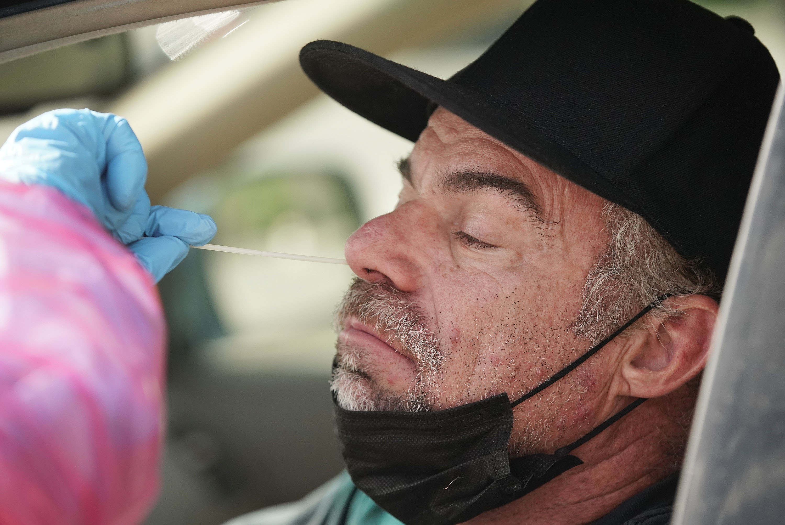 Mark McComb is tested for COVID-19 at the Mount Olympus Senior Center parking lot in Millcreek on Oct. 5. Utah health officials confirmed 1,343 new COVID-19 cases and five deaths on Tuesday.