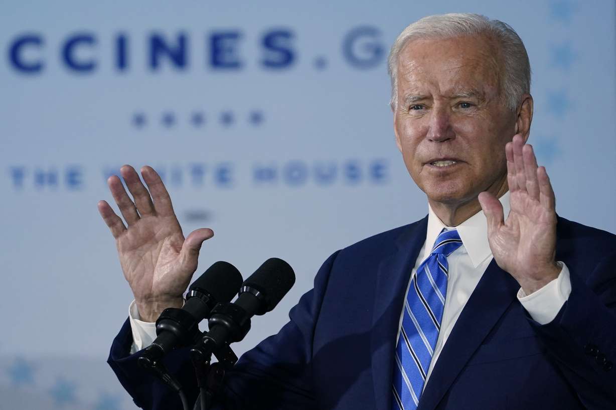 President Joe Biden speaks about COVID-19 vaccinations after touring a Clayco Corporation construction site for a Microsoft data center in Elk Grove Village, Ill., on Oct. 7.