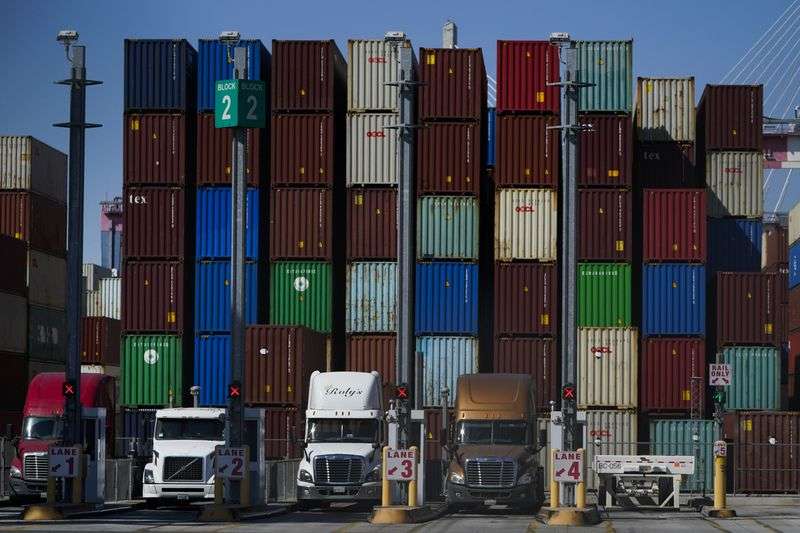Containers are stacked at the Port of Long Beach in
Long Beach in Calif., Friday, Oct. 1, 2021.