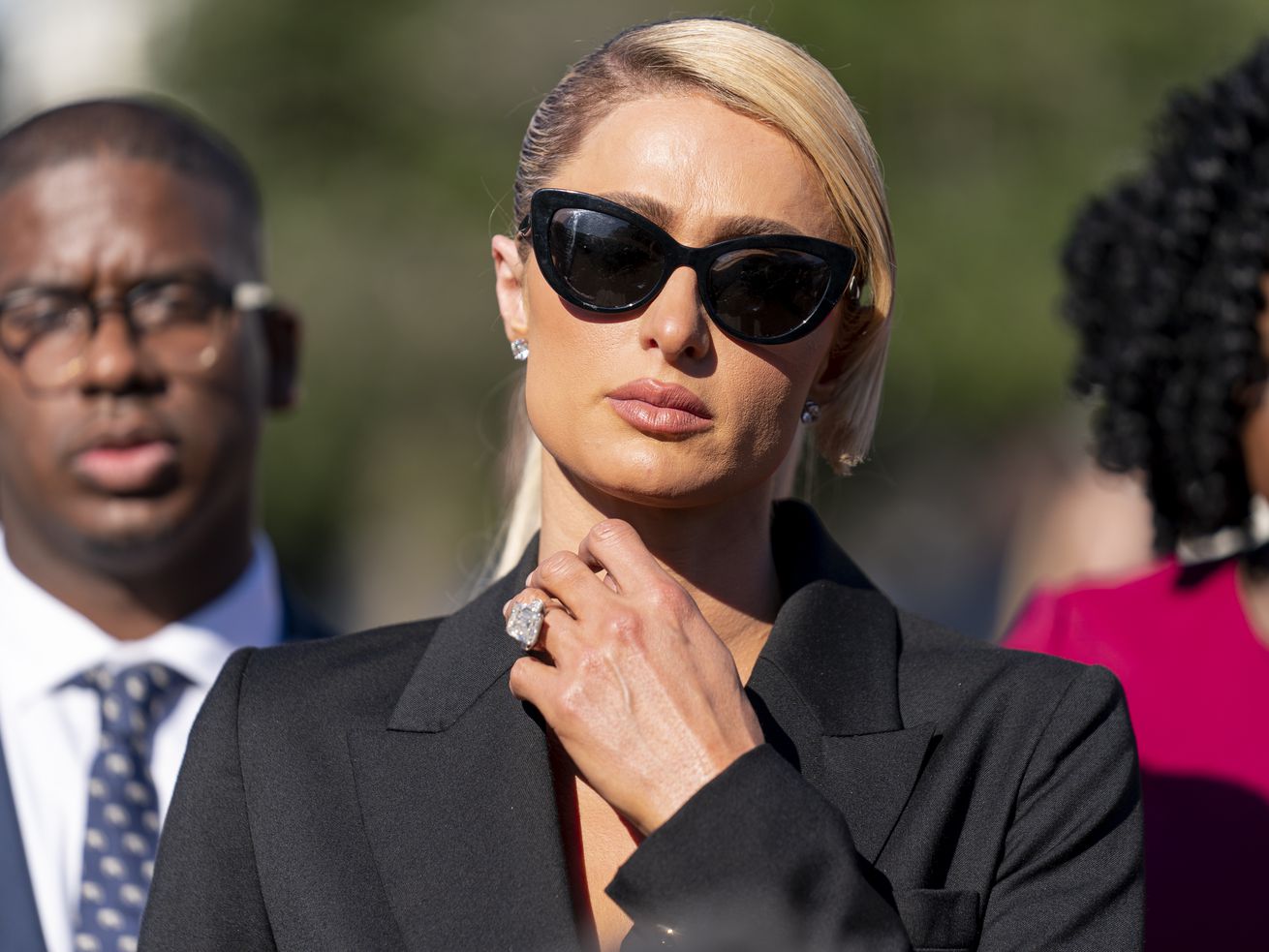 Hotel heiress and reality television star Paris Hilton lends her support for legislation to establish a bill of rights for children placed in congregate care facilities at the Capitol on Wednesday. Hilton says she was traumatized as a teenager when she was sent by her family to abusive care facilities.