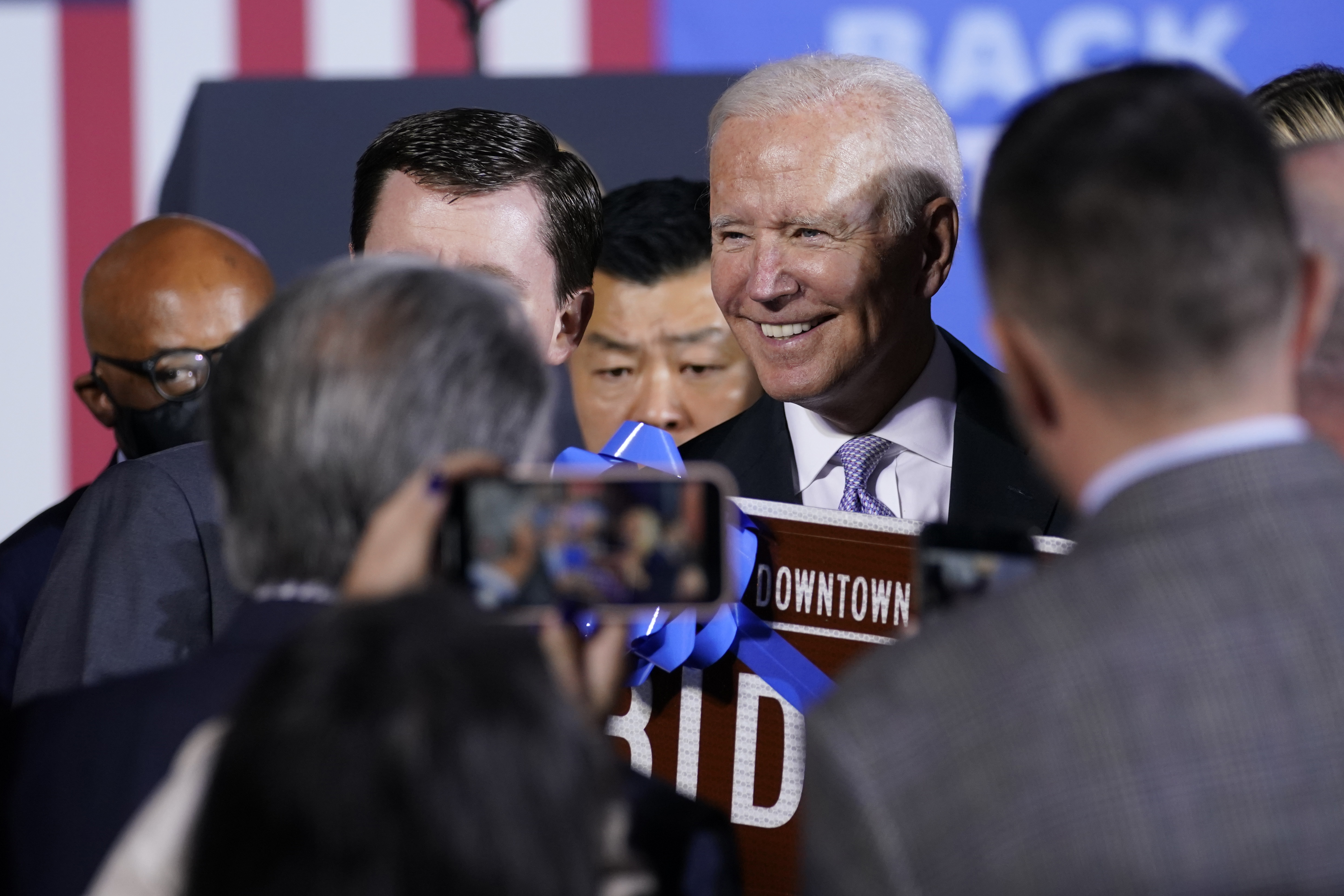 President Joe Biden greets people after speaking about his infrastructure plan and his domestic agenda in Scranton, Pa., Wednesday. In an abrupt change, the White House is floating new plans to pay for parts of President Joe Biden's $2 trillion social services and climate change package, shelving a proposed big increase in corporate tax rates though also adding a new billionaires' tax on the investment gains of the very richest Americans.