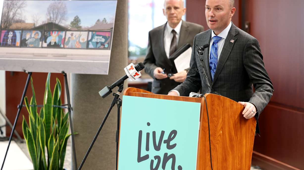 West Valley Mayor Ron Bigelow, left, listens as Gov. Spencer Cox speaks at West Valley City Hall on March 16. A new report from the Utah Department of Health and the Utah Suicide Prevention Coalition shows that suicides and drug overdoses did not increase in Utah during the pandemic.