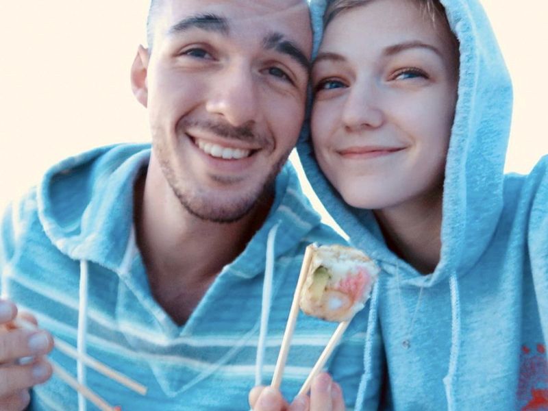 Gabrielle Petito, 22, who was reported missing on Sept. 11, after traveling with her boyfriend around the country in a van and never returned home, poses for a photo with Brian Laundrie in this undated handout photo.