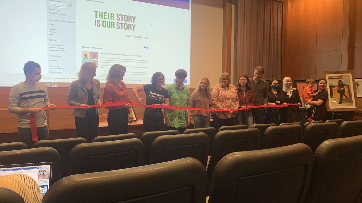 People from BYU's Library and Their Story is Our Story celebrate the launch of the Global Refugee Archive, a database of refugee stories, on Oct. 21, 2021.