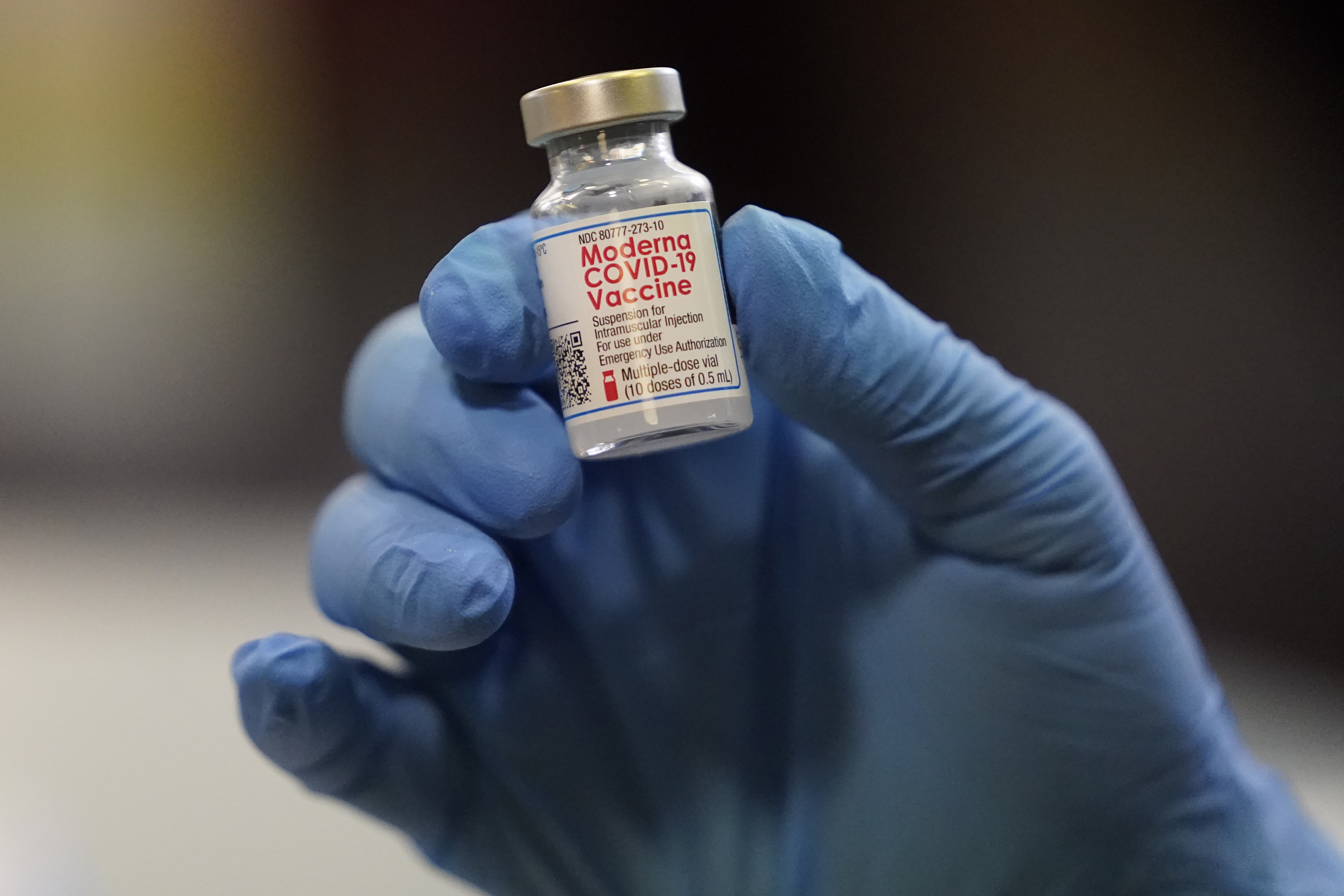 This Tuesday, Jan. 5, 2021 file photo shows a vial of the Moderna COVID-19 vaccine at a pop-up vaccine clinic in Salt Lake City. U.S. regulators on Wednesday ruled on authorizing booster doses of the Moderna and Johnson & Johnson COVID-19 vaccines.