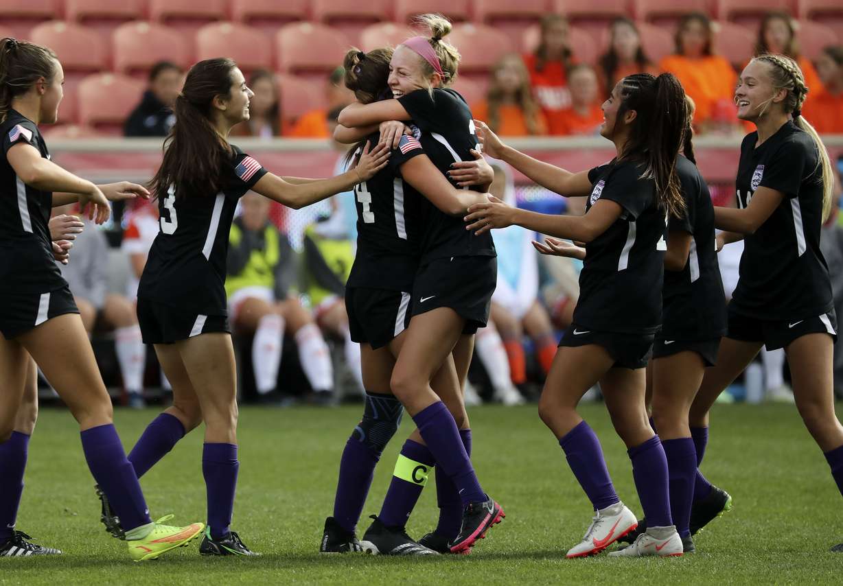 Riverton’s Belle Christensen is congratulated after scoring against Skyridge’s goalie Emalynn Levingston in the 6A championship match at Rio Tinto Stadium in Sandy on Friday, Oct. 22, 2021.