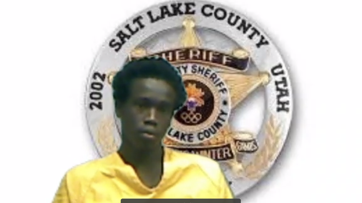 Buk Mawut Buk appears in a 3rd District Court hearing on Friday. Buk is charged with aggravated murder in the death of University of Utah football player Aaron Lowe.