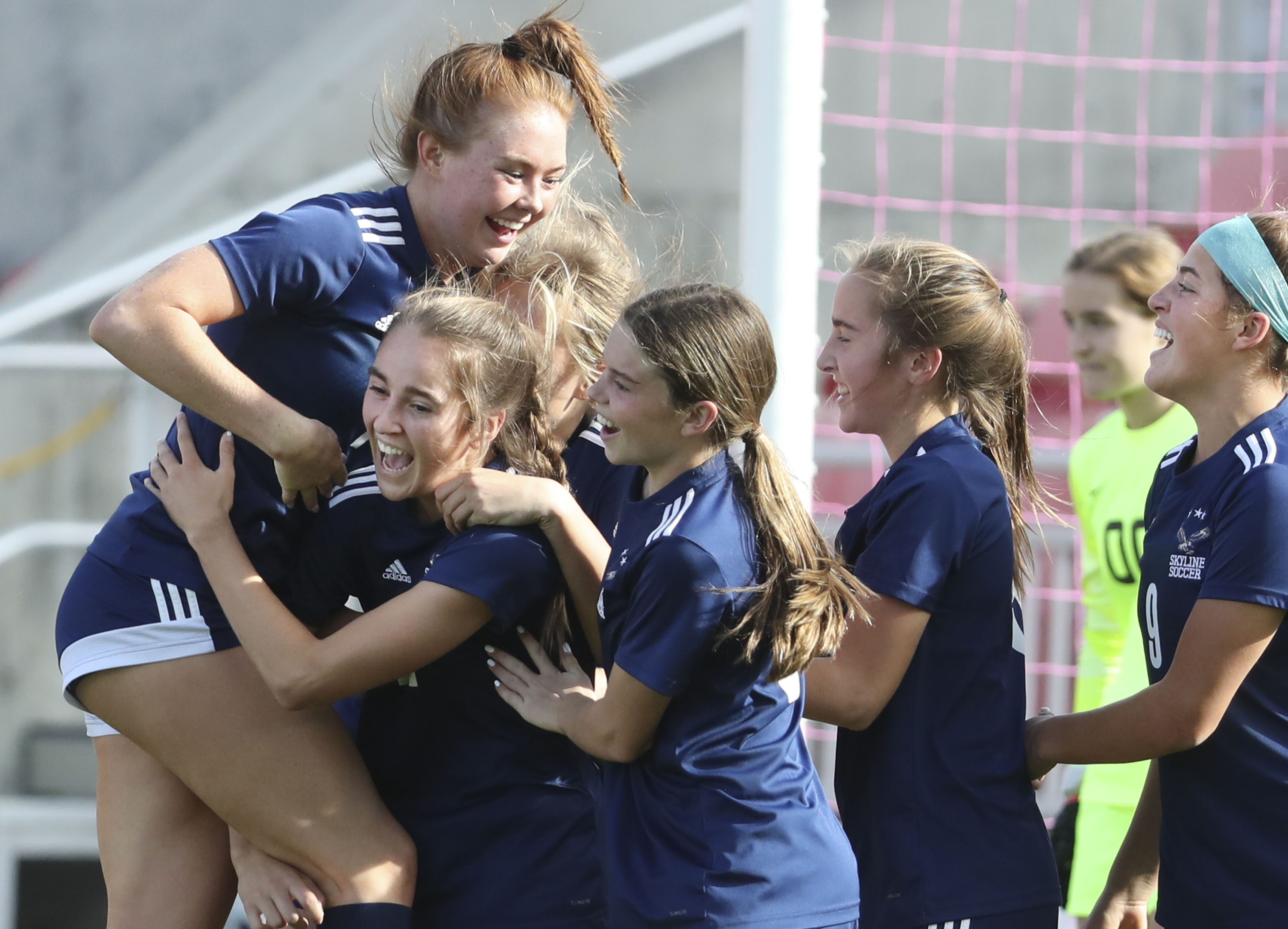 Skyline players celebrate Lily Boyden’s goal against Lehi in the 5A girls soccer state championship match at Rio Tinto Stadium in Sandy on Friday, Oct. 22, 2021.