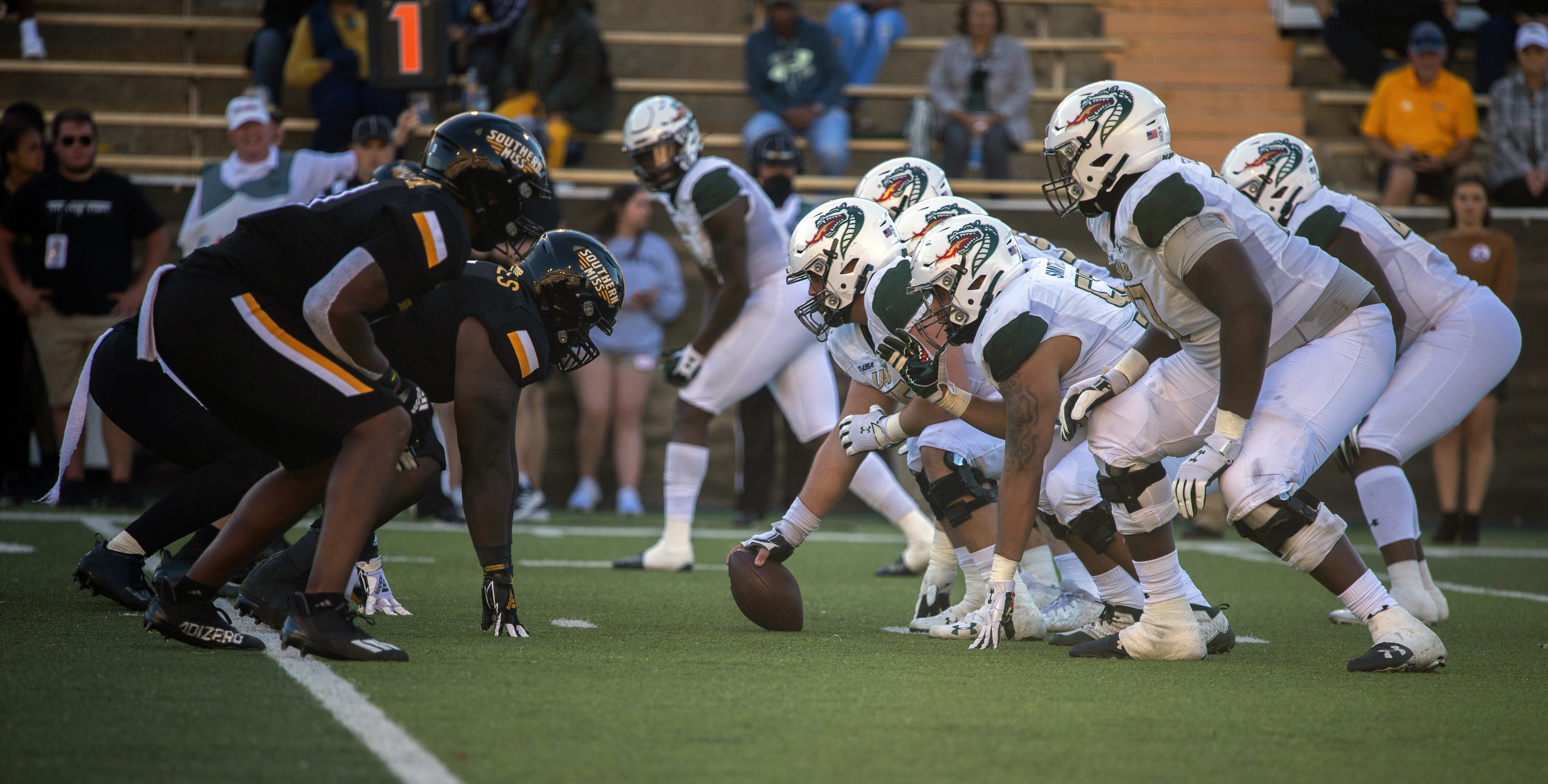 Southern Mississippi, left, and UAB face off at the line of scrimmage during the third quarter of an NCAA college football game in Hattiesburg, Miss., Saturday, Oct. 16, 2021.