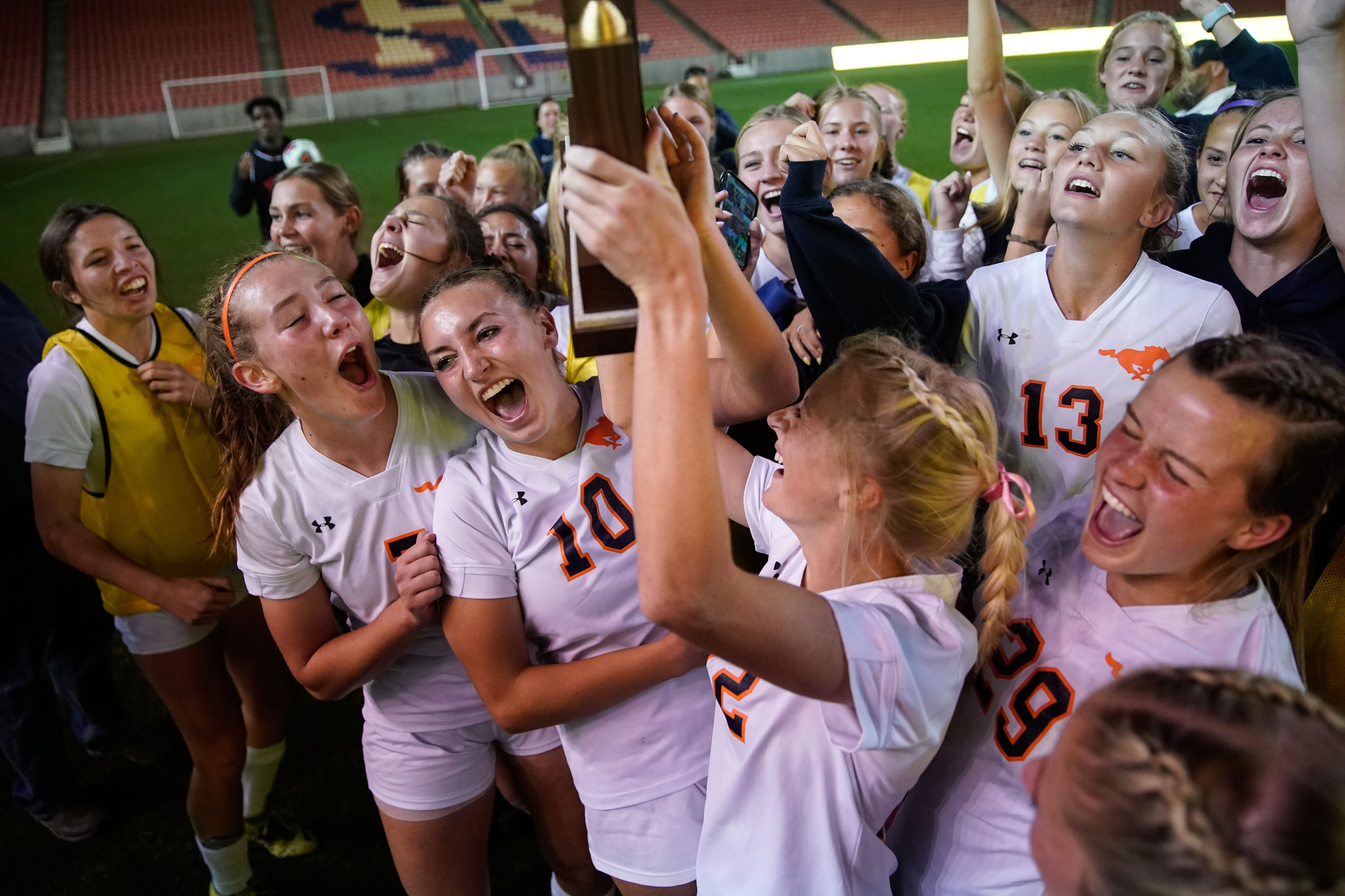Mountain Crest soccer team cheers after winning the 4A girls soccer state championship game against Crimson Cliffs  on Friday, Oct. 22, 2021 at Rio Tinto Stadium in Sandy .