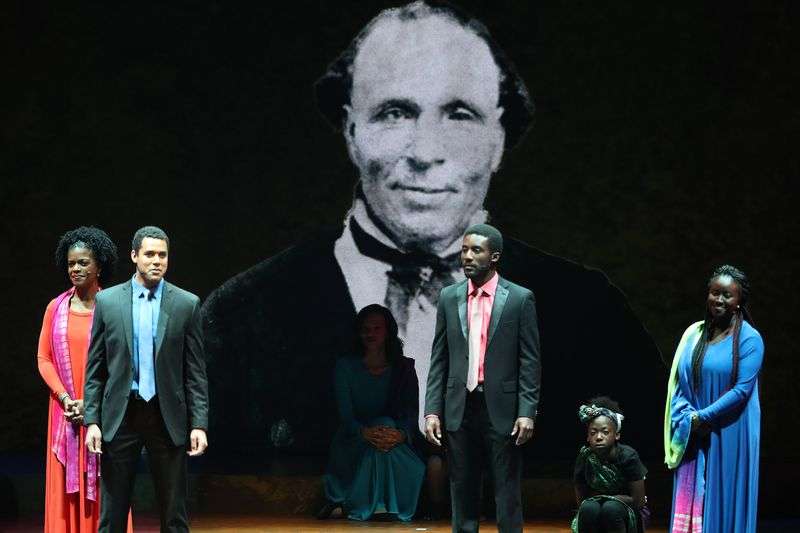 Performers talk about early black LDS Church members
during the "Be One” program in Salt Lake City on Friday, June 1,
2018. The event celebrates the 40th anniversary of the church’s
1978 revelation on the priesthood.