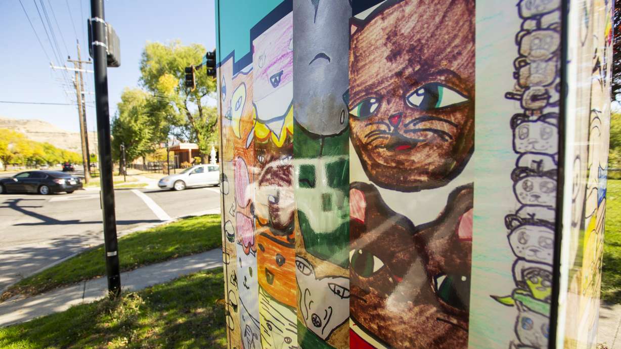 Utility boxes wrapped with original artwork printed on vinyl are pictured in the Rose Park neighborhood of Salt Lake City on Oct. 15, 2018.