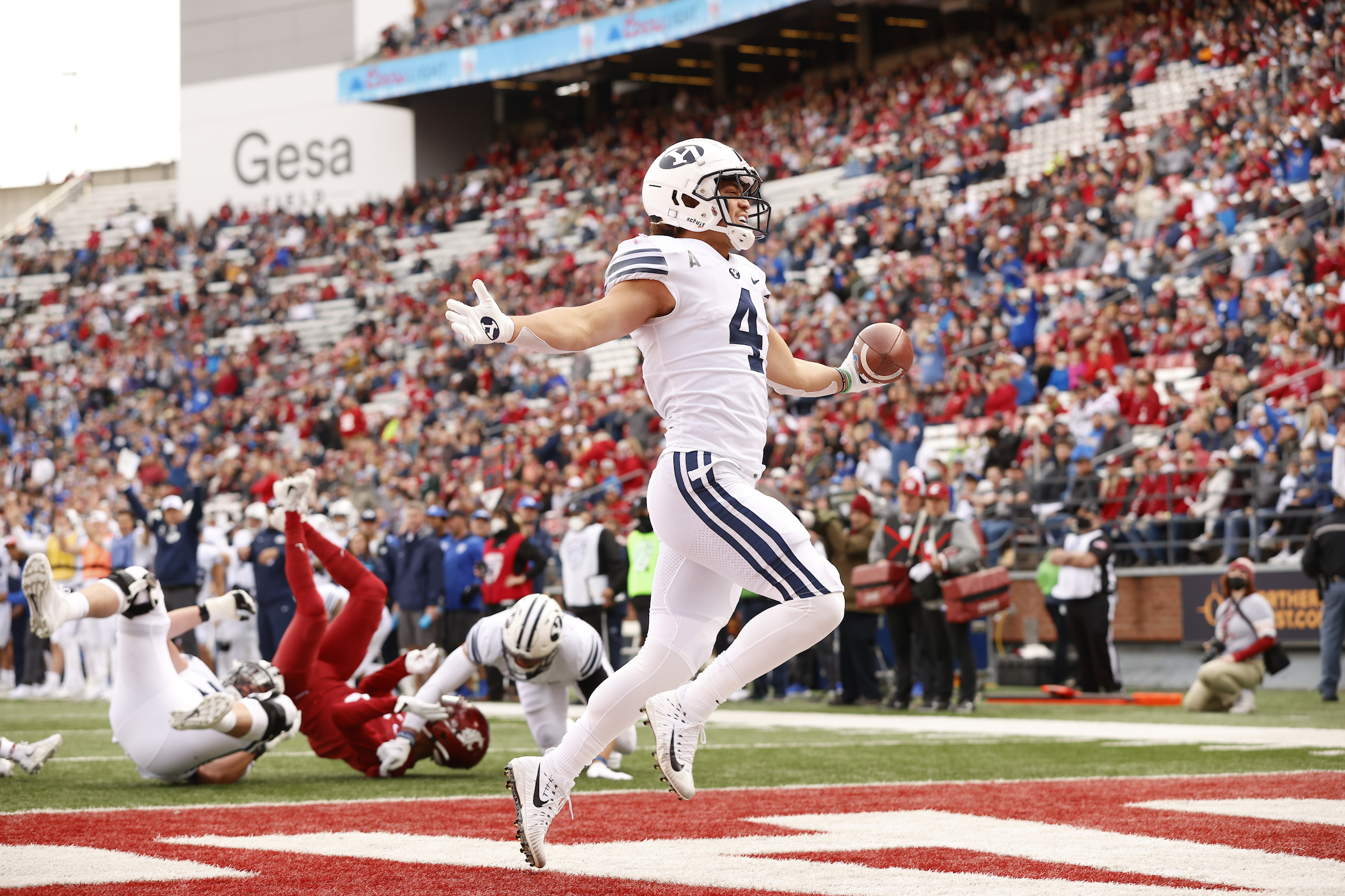 BYU running back Lopini Katoa celebrates a 3-yard touchdown run against Washington State, Saturday, Oct. 23, 2021 in Pullman, Washington.