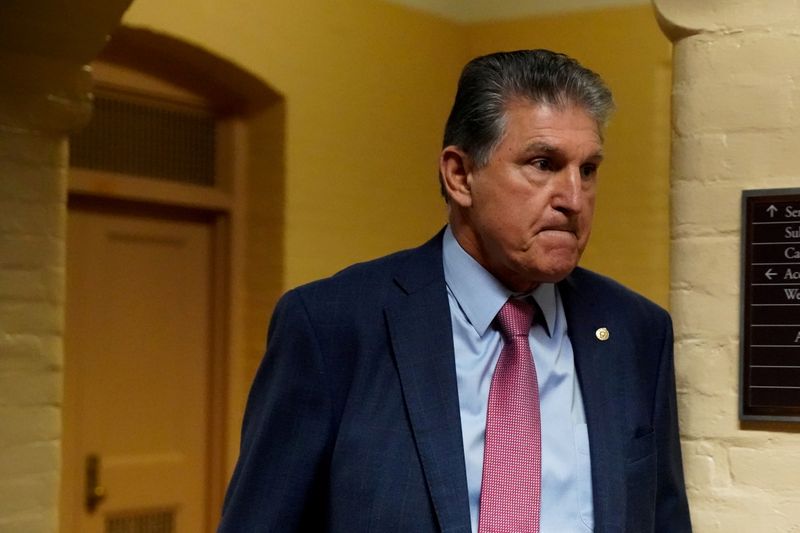 Sen. Joe Manchin, D-West Virginia, walks through the U.S. Capitol in Washington, D.C., on Oct. 21.