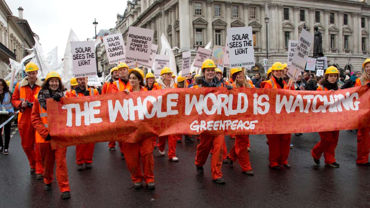 Marchers with a placard in People's climate march in London on November 29, 2015. Greenhouse gas concentrations hit a new record high last year and increased at a faster rate than the annual average for the last decade despite a temporary reduction during pandemic lockdowns, a report released Monday says.