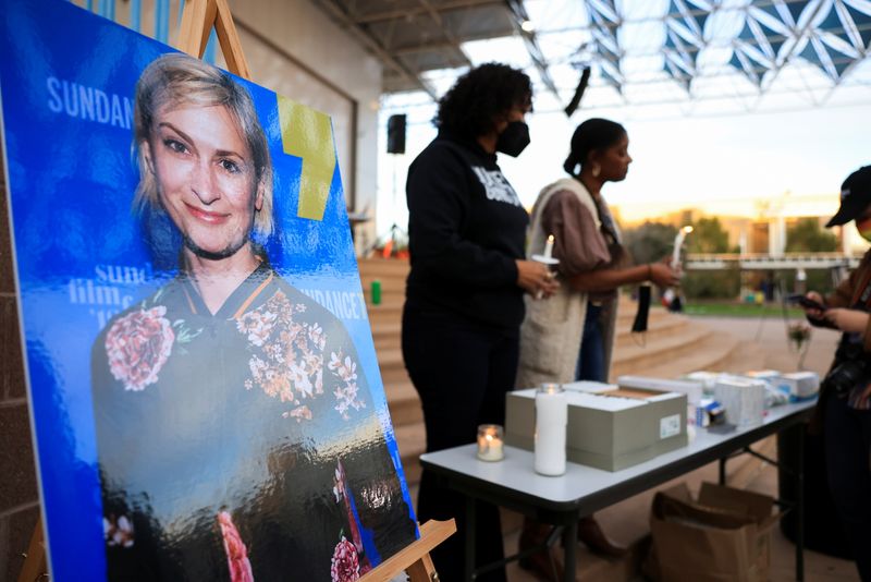 An image of cinematographer Halyna Hutchins, who died after being shot by Alec Baldwin on the set of his movie "Rust", is displayed at a vigil in her honour in Albuquerque, New Mexico, Saturday.