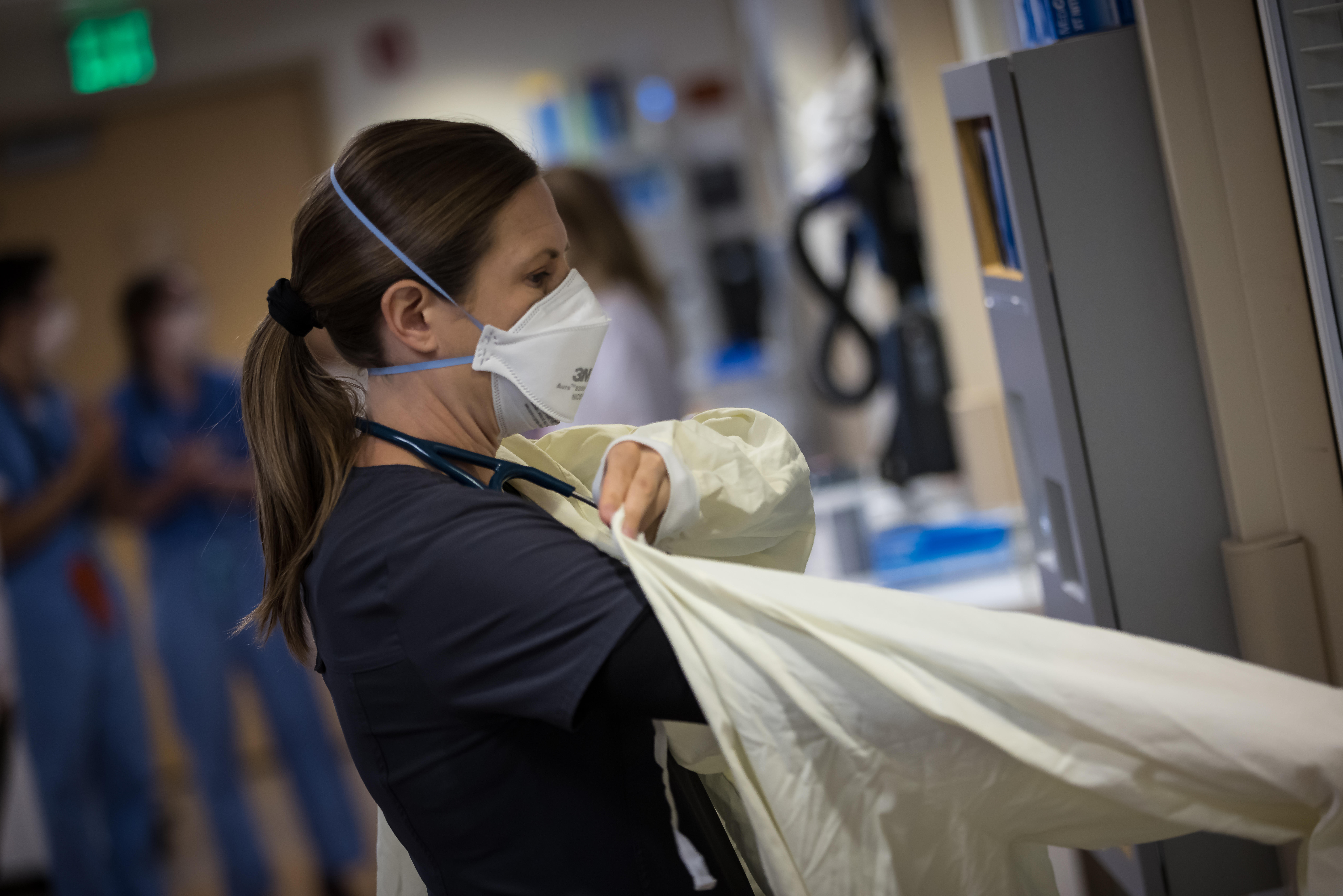 A University of Utah Health worker treats patients inside the medical intensive care unit at University of Utah Hospital on July 30. Utah health officials on Monday confirmed 3,636 new COVID-19 cases since Friday, as well as 21 deaths.