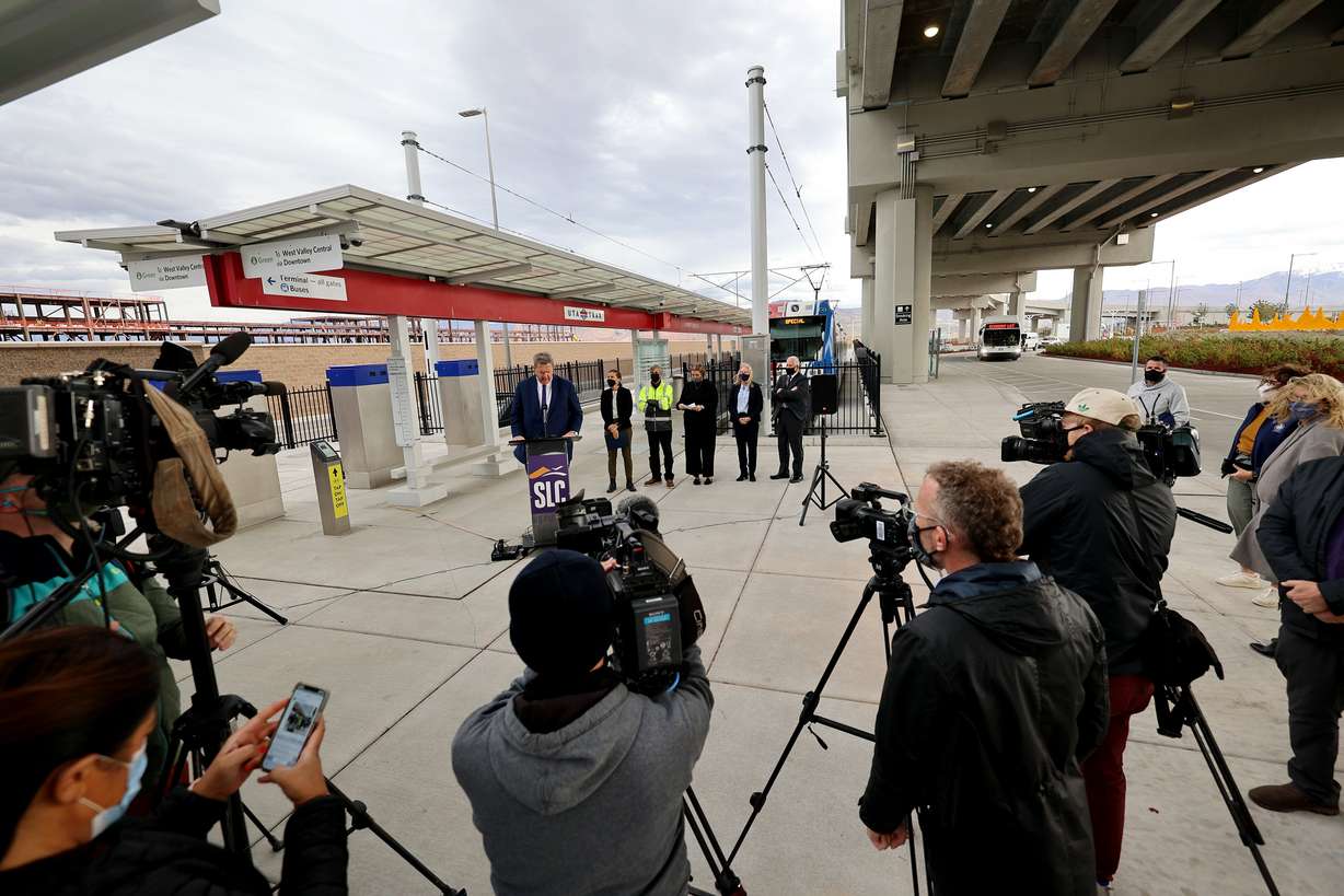 Carlton Christensen, chairman of the board of trustees at Utah Transit Authority, speaks as officials gather to celebrate the new TRAX airport station, marking the culmination of 20 months of construction extending TRAX to the new airport terminal, in Salt Lake City on Monday, Oct. 25, 2021.
