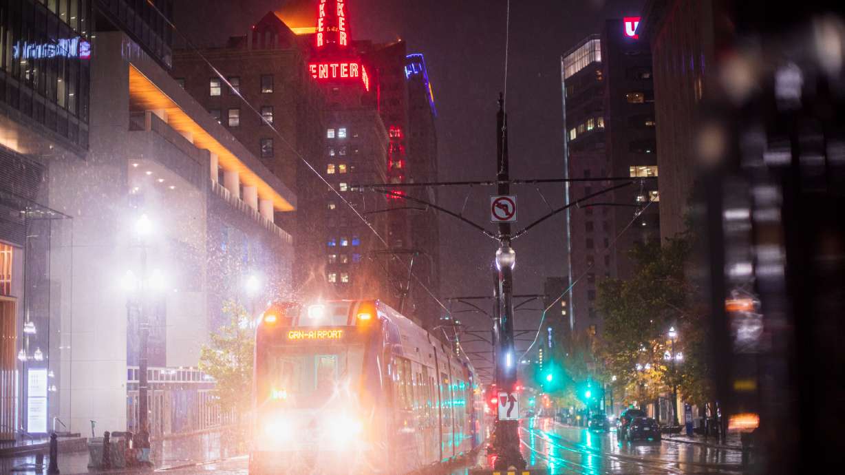 A TRAX train moves through the rain in downtown Salt Lake City Monday night. A flood advisory was issued for Salt Lake City Monday.