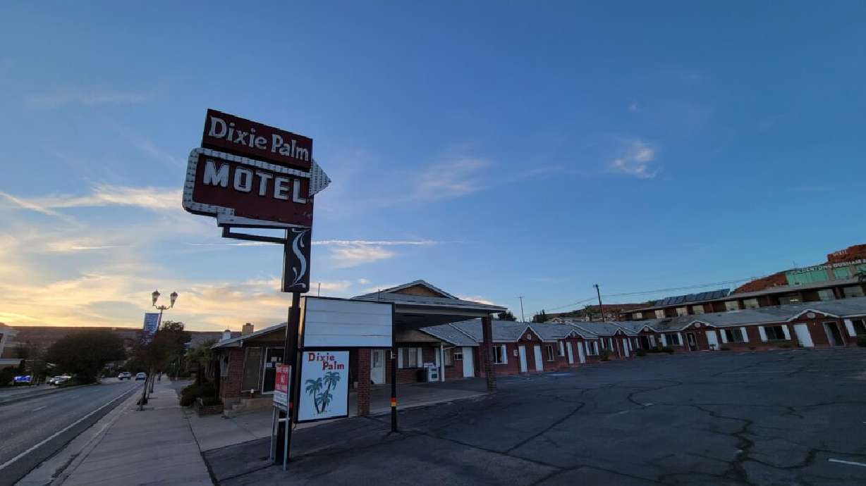 The sun sets on the Dixie Palm Motel the night before the lodging's iconic neon sign was taken down at the start of demolition, St. George, Utah, Oct. 19.